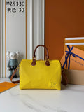 Boston Bag / Perforated Barrel Handbag